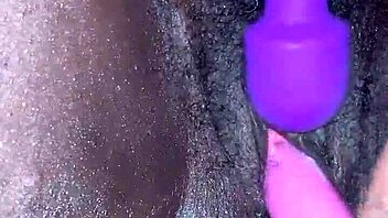 Ebony wife reaches creamy orgasm with toys in amateur video