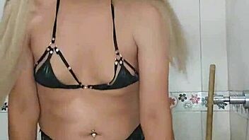 rich transsexual in the bathroom doing nice things with crossdressing and toys