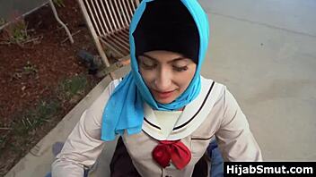 Girl in hijab learns about sex techniques.