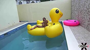 Maxine X Plays With Her Pussy As She Sunbathes In The Pool