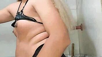 rich transsexual in the bathroom doing nice things with crossdressing and toys