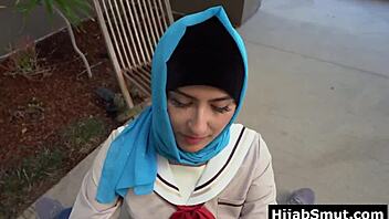 Girl in hijab learns about sex techniques.