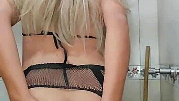 rich transsexual in the bathroom doing nice things with crossdressing and toys