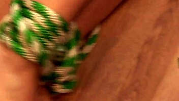 Blonde milf bondage fantasy in kitchen.