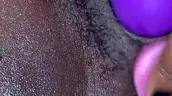 Ebony wife reaches creamy orgasm with toys in amateur video