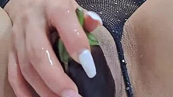 Colombian latina uses eggplant to pleasure her pussy in solo masturbation.