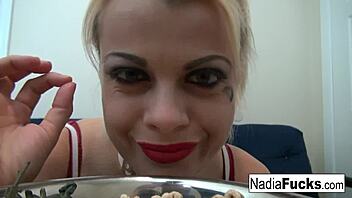 hot nadia enjoys cereal mixed with tiny soldier figures in a playful solo moment