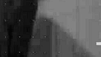 Young girl enjoys rooftop experience with friend