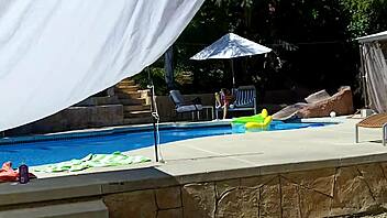 Lexi Bloom participates in pool activity with friends