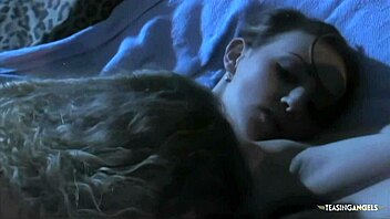 hot skinny lesbians suck pussy and finger each other on the bed.