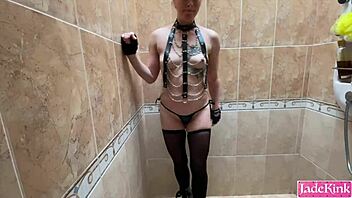 Handcuffed slut face fucked in bathroom shower with cum in mouth