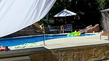 Lexi Bloom participates in pool activity with friends