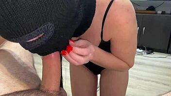 Stepmom with big tits sucks my dick in a mask, cum on her tongue.