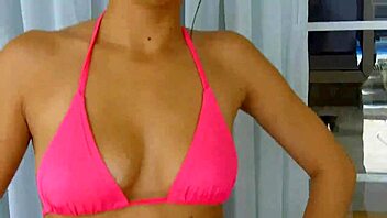 Lexi Bloom participates in pool activity with friends