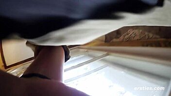 ersties exhibitionist babe plays with her wet pussy in a public restroom