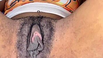 Exclamatory raw horny slut edges her ebony hairy pussy with tongue close up!