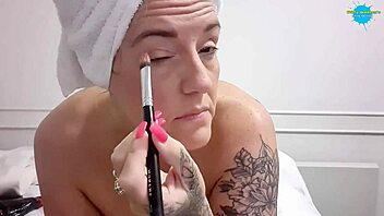 Topless Mature Woman Prepares Makeup