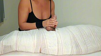 in part3 the mummified handjob session gets interrupted right before the cum release for two minutes