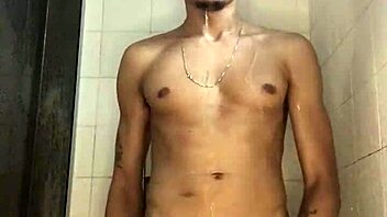 The young guy with a thick cock jerked off vigorously in the shower during his bath.