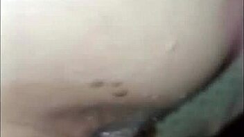 brunette slut gets anal fucked by a guy in feminine clothes while moaning loudly until he cums inside her huge ass