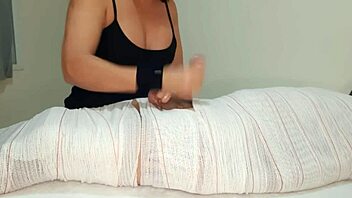 in part3 the mummified handjob session gets interrupted right before the cum release for two minutes