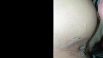 brunette slut gets anal fucked by a guy in feminine clothes while moaning loudly until he cums inside her huge ass