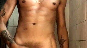 The young guy with a thick cock jerked off vigorously in the shower during his bath.