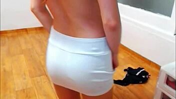 Do you like this hot girl in shiny pink satin panties?