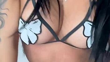 Brunette Colombian latina with big tits and fake tits worships her ass in juicy play