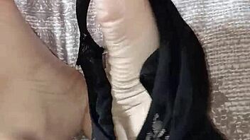 dark-haired gretala contrasts her sensual moves by rubbing thong against bare feet in alternative ebony style