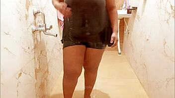 Myanmar milf enjoys a steamy shower, lathering up her curves in a relaxing bath.