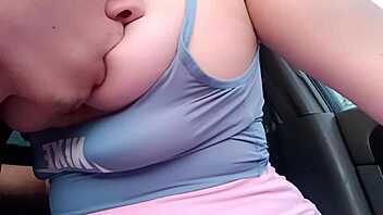 Sexy student offers her big tits for sucking in the car after getting a ride from me