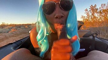 Petite ebony nympho gives sloppy deepthroat blowjob to massive black cock in car until huge cumshot covers her