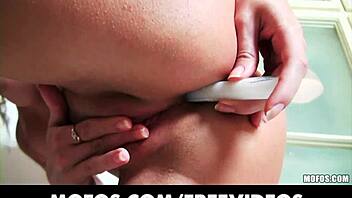 Curly haired blonde bombshell masturbates solo with her wet panties