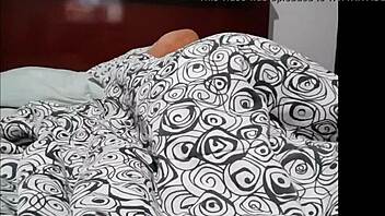 In a quiet moment, the blonde woman explores personal pleasure through solo activities on webcam.