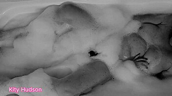 kity hudson enjoys bath time with hairy pussy toy orgasm in homemade video