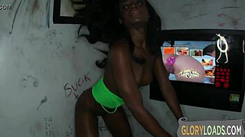 hot ebony babe sucks cock deep at gloryhole