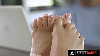 footsie babes hot candee licious gets her pretty feet covered in cum after office encounter