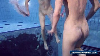 I-I'm watching these horny girls strip each other in the pool, so hot