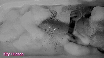 kity hudson enjoys bath time with hairy pussy toy orgasm in homemade video