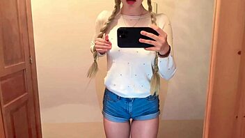 Hey, cute college girl films herself in the mirror and gets super horny