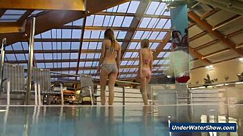 I-I'm watching these horny girls strip each other in the pool, so hot