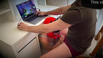 This ginger girl started sucking my cock while I was deep into playing Dota 2.