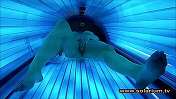 check out this beautiful woman caught masturbating on hidden solarium cam 😏📹