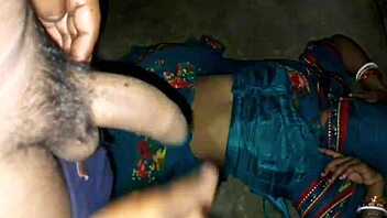 Indian village woman engages in intense intimate encounter with a playful partner.