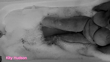 kity hudson enjoys bath time with hairy pussy toy orgasm in homemade video