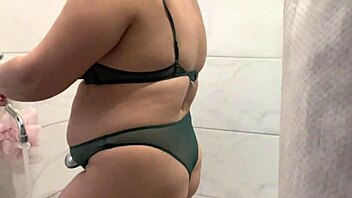 Hidden Camera Captures Stepmother's Shower with Big Ass and Natural Tits