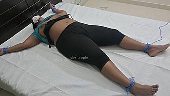 Hey, that Indian girl is having some wild BDSM fun with ropes and toys in this steamy session