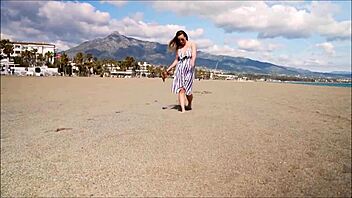 Denise Klarskov flashes publicly during her exciting trip to Malaga Spain feeling thrilled