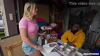 In a garage setting, a muscular bodybuilder explores athletic pursuits with enthusiasm.